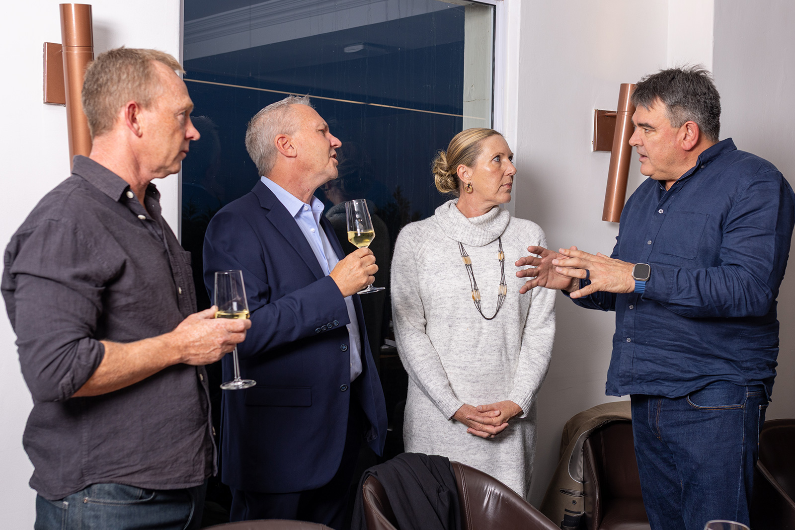 Candid executive interaction at Paystack Four Seasons dinner